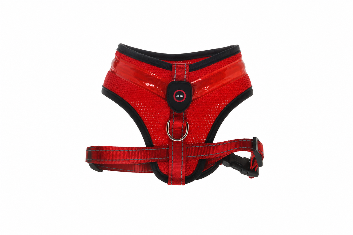 Red GlowPup LED safety harness on a white background
